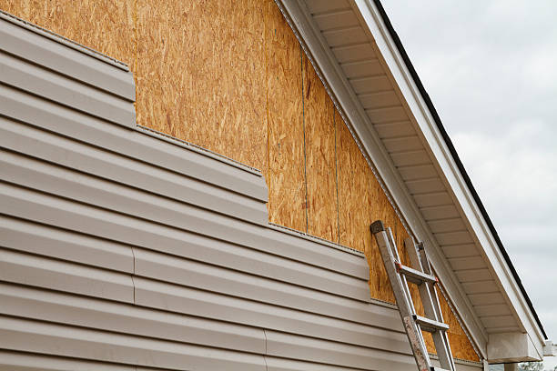 Professional Storm Damage Siding Repair technician working in Youngstown, OH